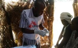 MSF staff providing treatment